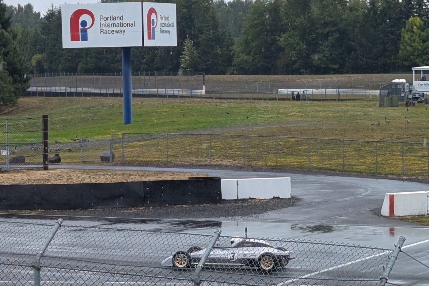 The number 3 Crosslé on a wet track at Portland International Raceway